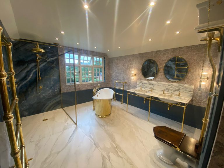Walk in shower, gold bath, his and her sinks