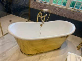 Gold roll top bath